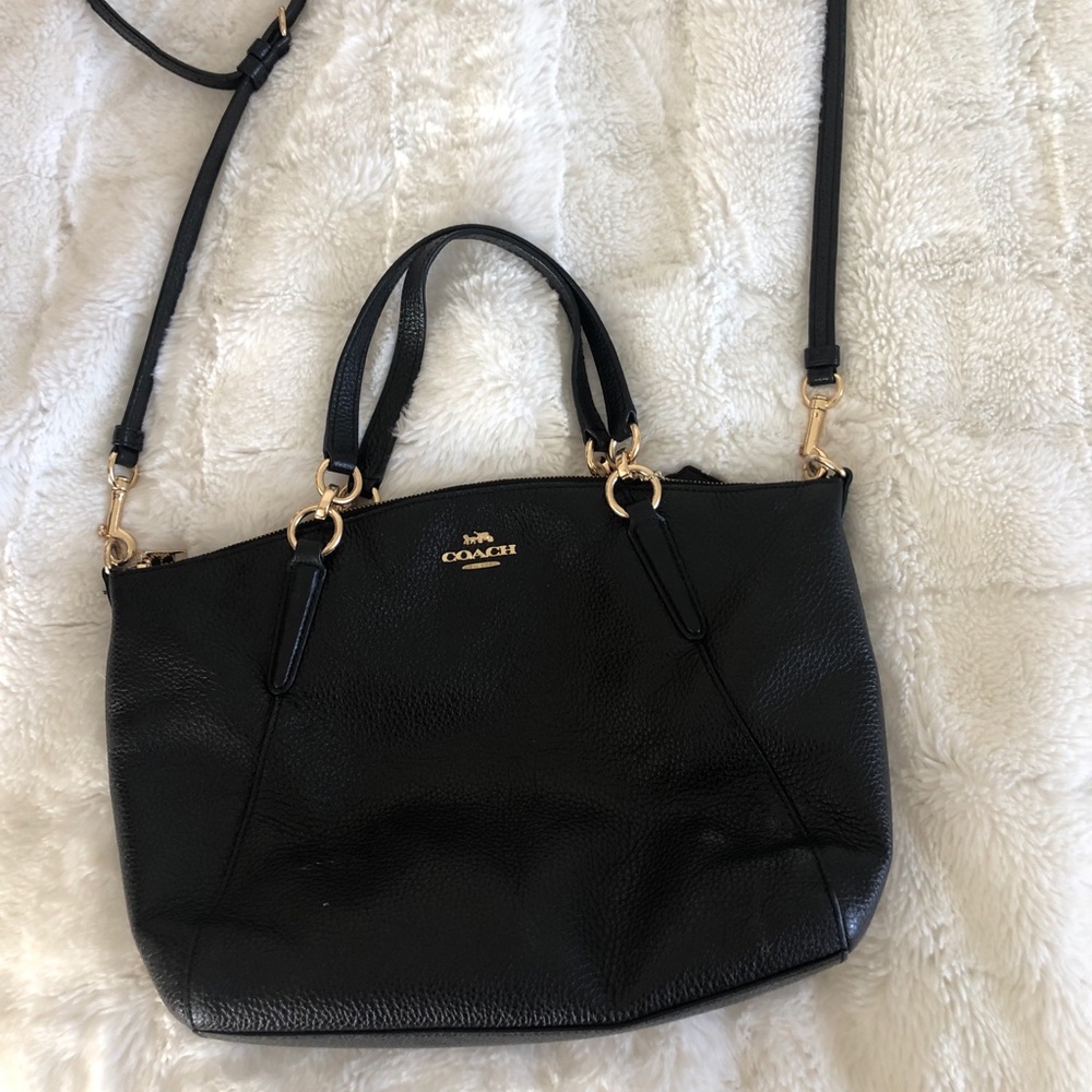 Black coach crossbody purse with gold accents